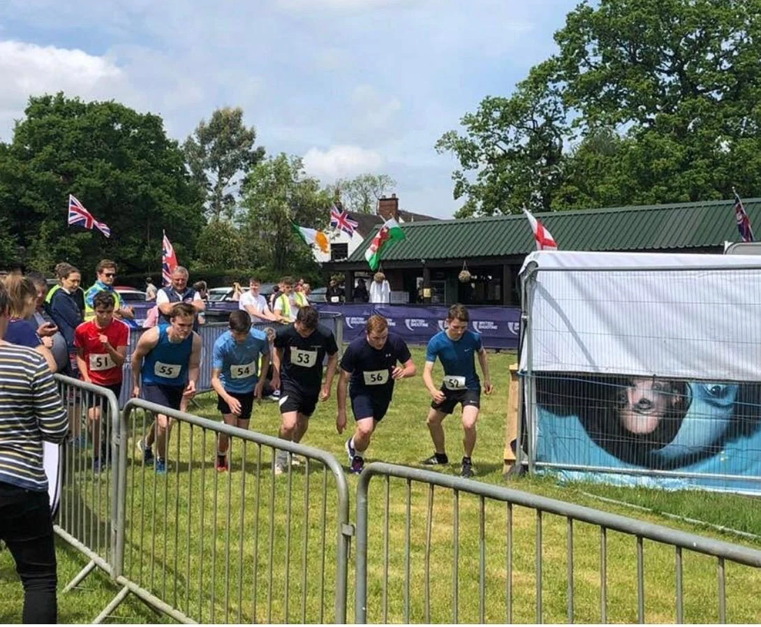 Competitors preparing to start an outdoor sporting event