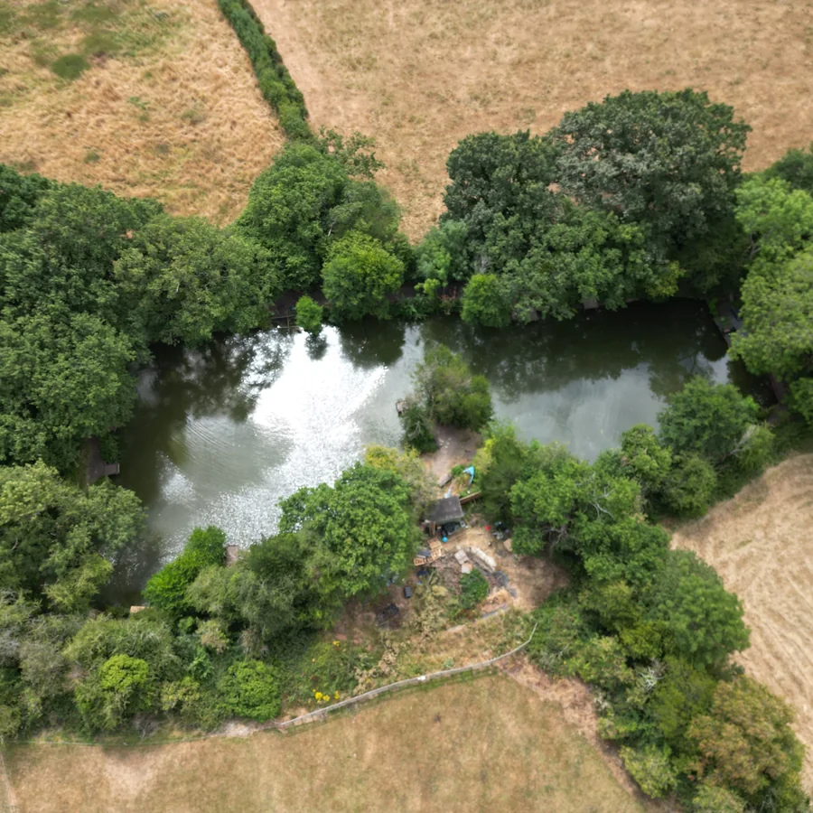 Aerial view of Botts Pool and the countryside beside Glanfar